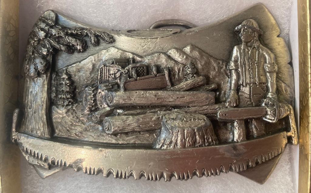 Vintage 1981 Metal Belt Buckle, Lumber Jack, Saw Cutting, Chain Saw, Saw Mill, Wood, Nice Design, 3 1/2", x 2", Heavy Duty, Quality, Made in USA, Thick Metal, For Belts, Fashion, Shelf Display, Western Wear, Southwest, Country, Fun, Nice