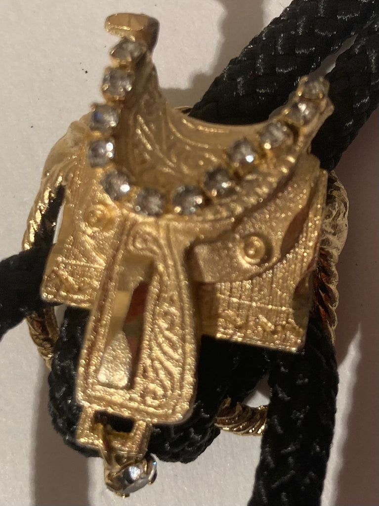 Vintage Metal Bolo Tie, Brass, Horse Saddle, Nice Crystals, Nice Leather Rope, Nice Design, 1 1/4" x 1", Nice Design, Made in USA, Quality, Heavy Duty, Country & Western, Cowboy, Western Wear, Horse, Apparel, Accessory, Tie, Nice Quality Fashion,