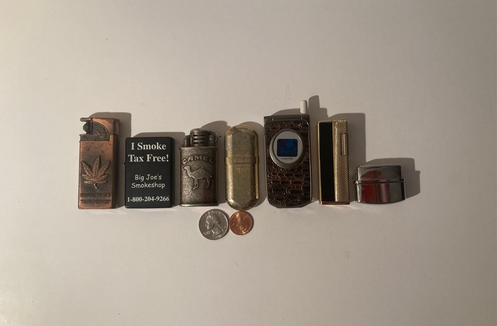 Lot of 7 Vintage Metal Lighters, Cigarettes, More, Pot Leaf, Phone