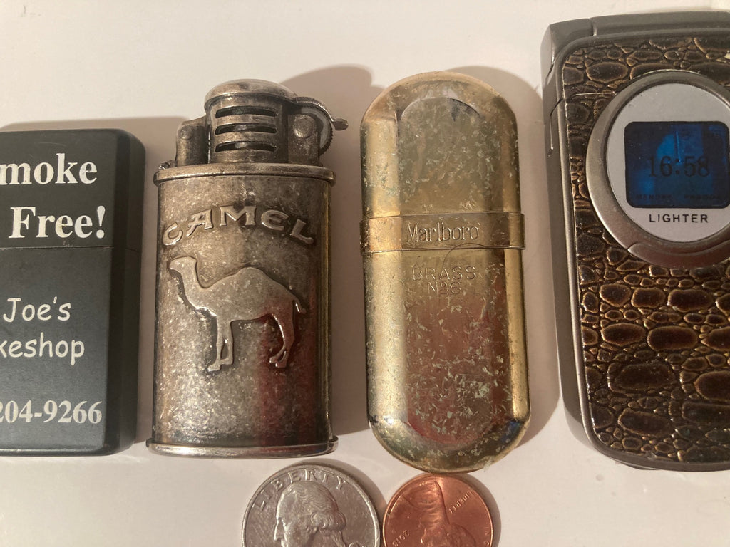 Lot of 7 Vintage Metal Lighters, Cigarettes, More, Pot Leaf, Phone