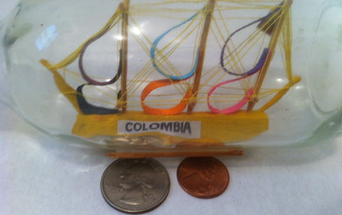 Vintage Ship in a Glass Bottle, Little Glass Bottle with a Boat Inside, about 5 3/4 inches long.  Vintage Nautical Display, Shelf Display