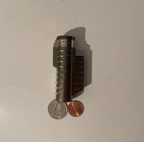 Vintage Metal Lighter, Bazooka, Cigarettes, More. This lighter does not light up when I play with it, I did not try it any more than that.
